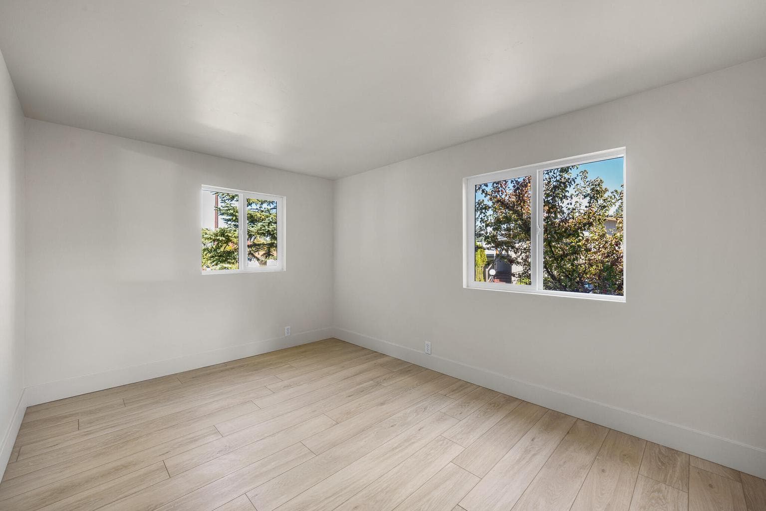 3rd room is light and bright, would make a great office.