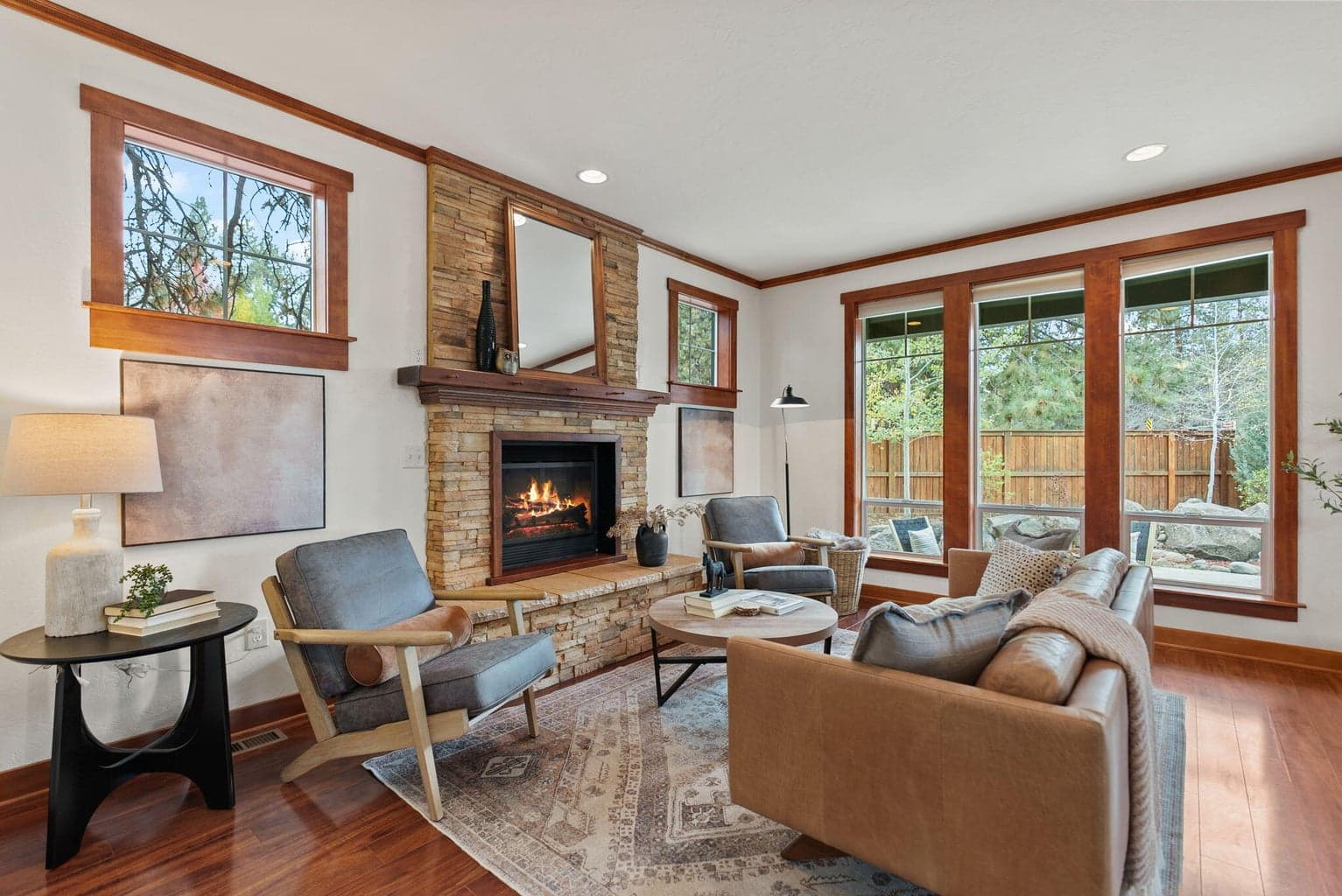 1,635 SF home features 3-bedrooms, 2.5-baths, a loft, and Great Room with a propane fireplace, kitchen and dining area.