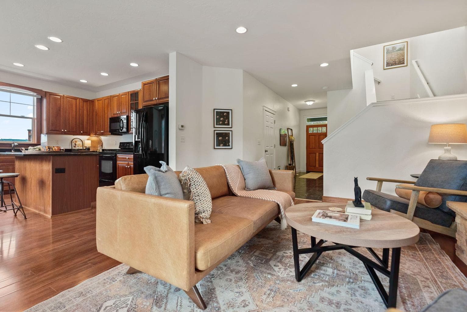 1,635 SF home features 3-bedrooms, 2.5-baths, a loft, and Great Room with a propane fireplace, kitchen and dining area.