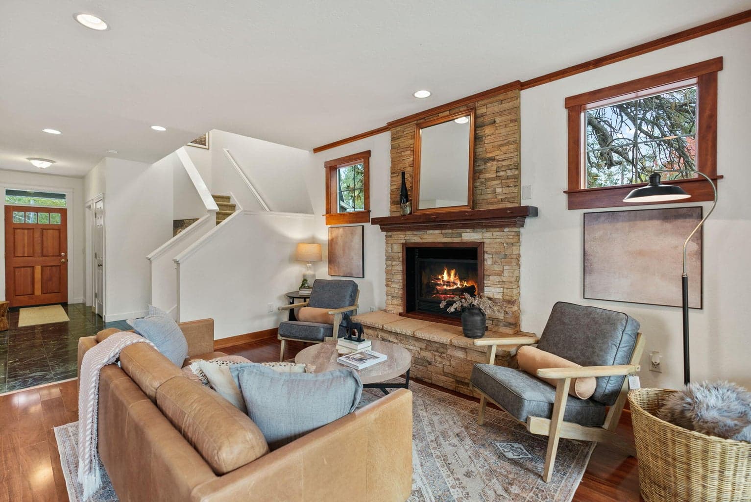 1,635 SF home features 3-bedrooms, 2.5-baths, a loft, and Great Room with a propane fireplace, kitchen and dining area.