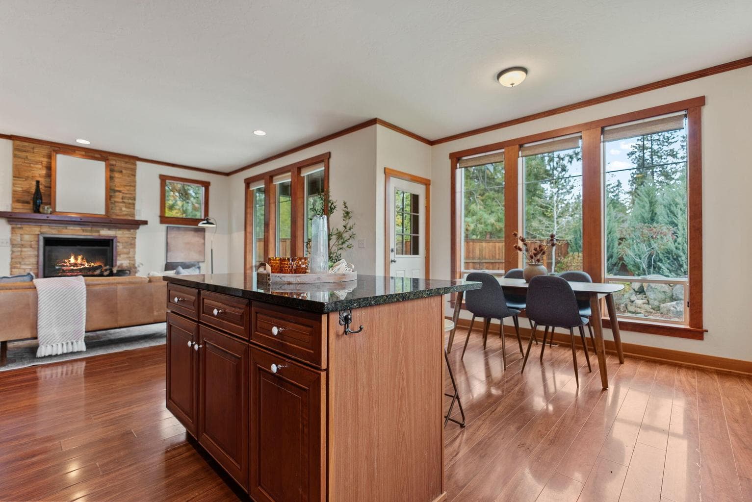 Great Room, Kitchen, Dining Area: Kitchen Island with Breakfast Bar, Soft-Close Cherry Cabinets, Pantry Cupboard, and Granite Countertops