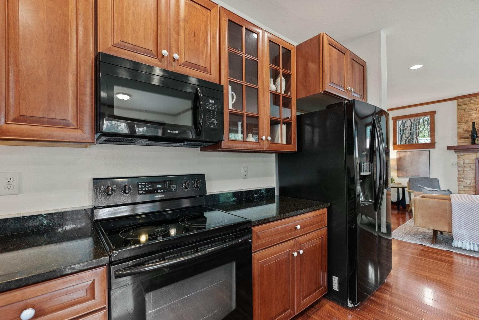 Great Room, Kitchen, Dining Area: Kitchen Island with Breakfast Bar, Soft-Close Cherry Cabinets, Pantry Cupboard, and Granite Countertops