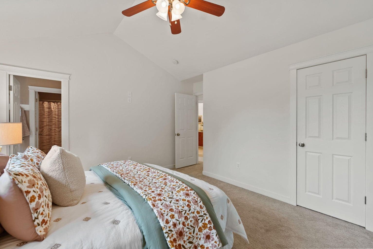 Upstairs primary suite with 2 walk-in closets, 2 vanities, and a separate commode and shower/tub