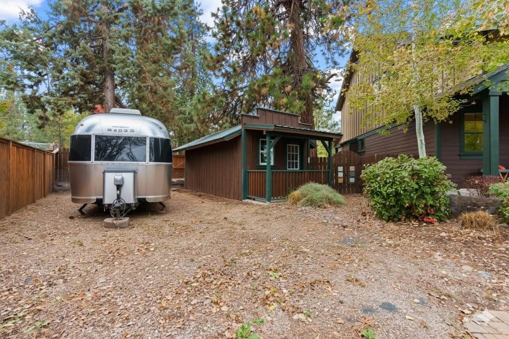 Save on storage: 2-Car attached garage with 2 walls of built-in storage PLUS park your 45-foot RV, boat, or rent it out. Raised garden beds, greenhouse, 180 SF shed/future playhouse.