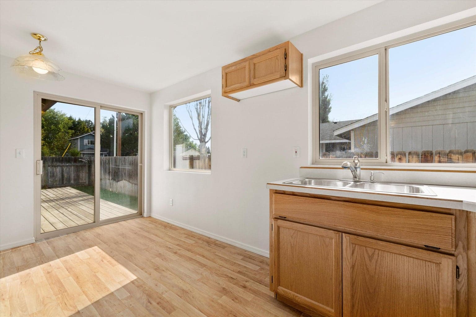 Kitchen and Breakfast nook with slider to deck