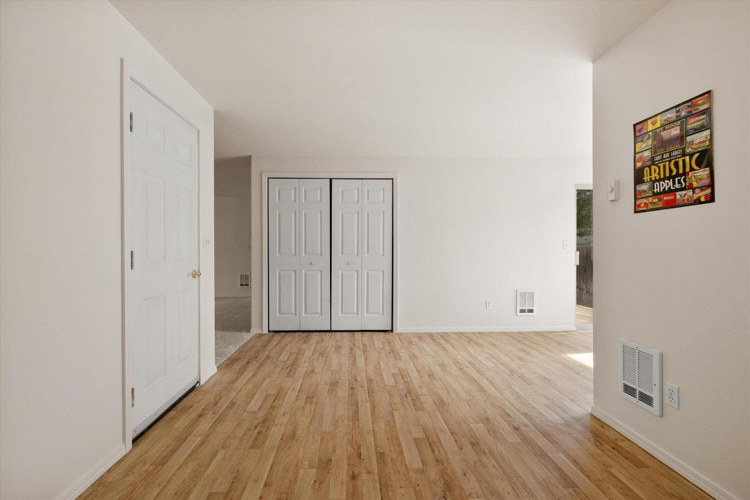 Garage door opens to newly upgraded woodlike floors
