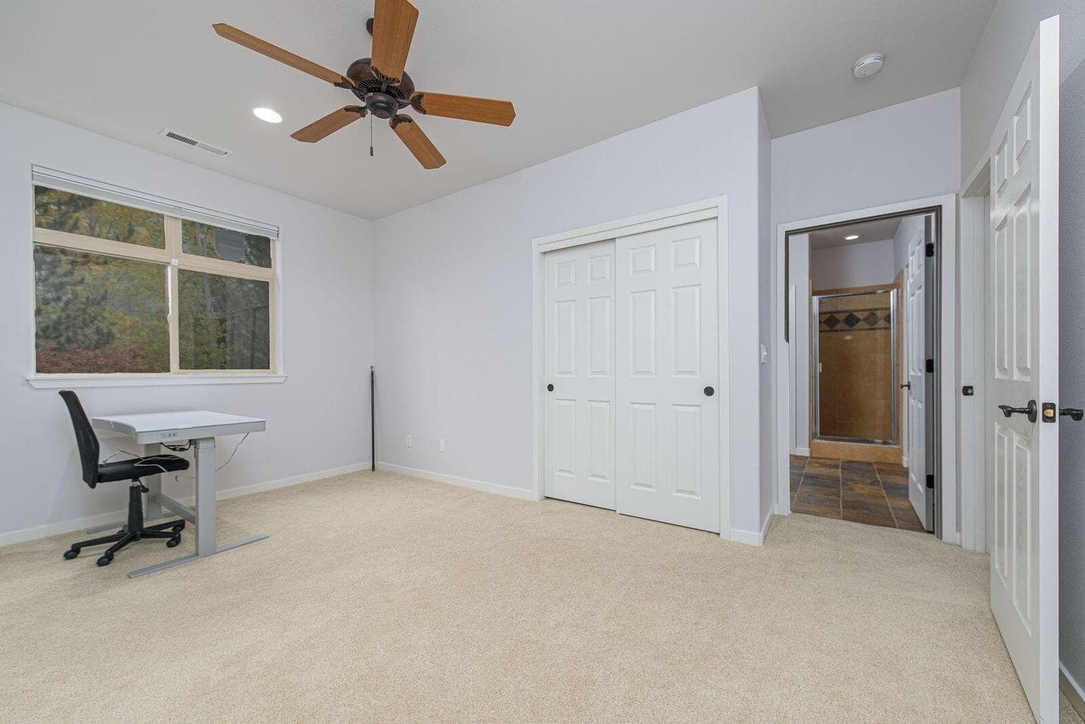 Third bedroom and ensuite bathroom on the upper level