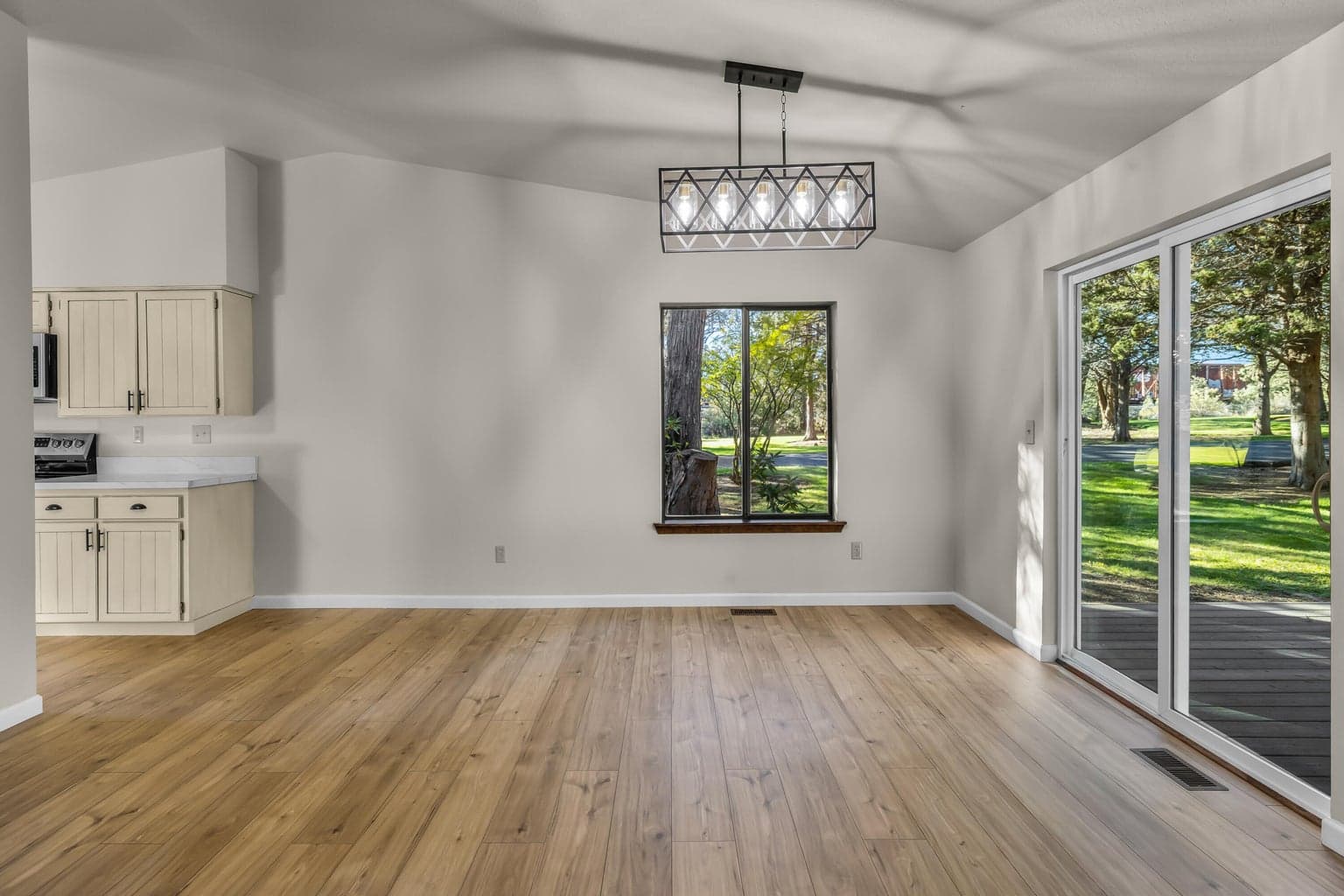 Living room towards dining area and kitchen,.