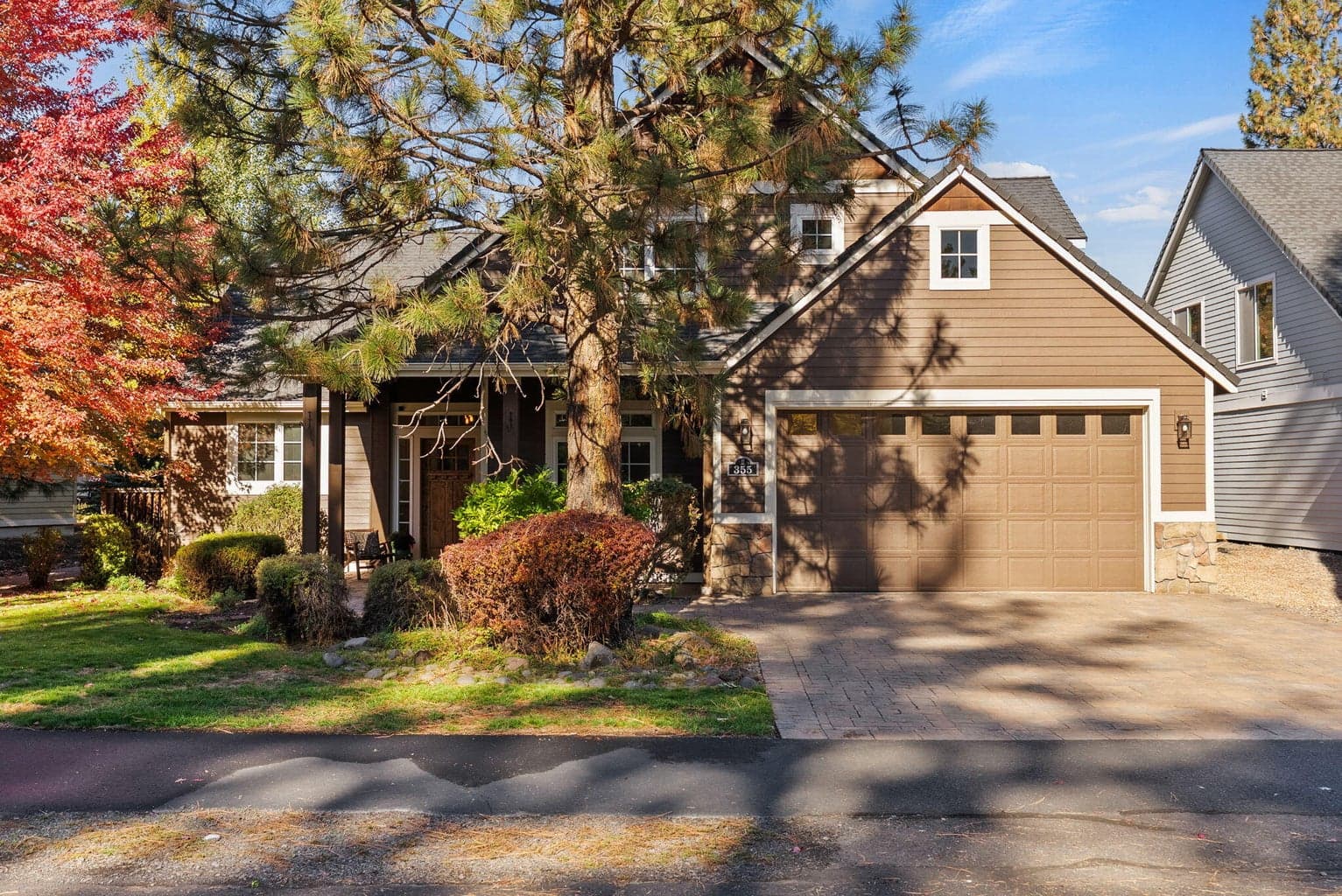 Paver driveway, front path, covered front porch area, covered back porch and side paths