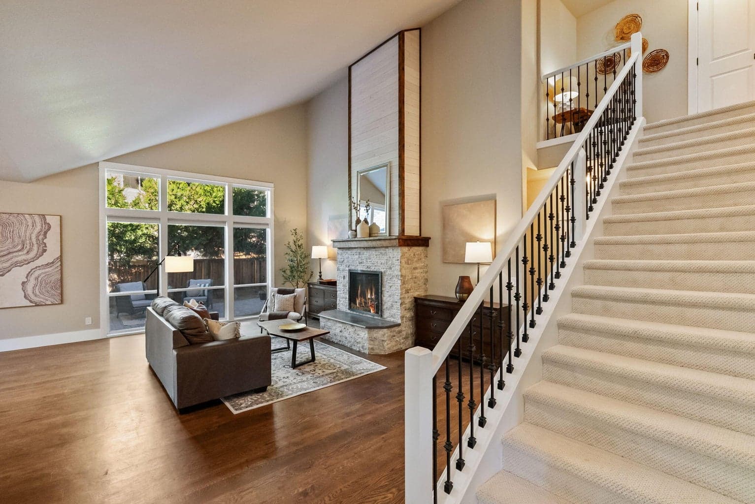 Great room with vaulted ceilings, propane fireplace and hardwood floors