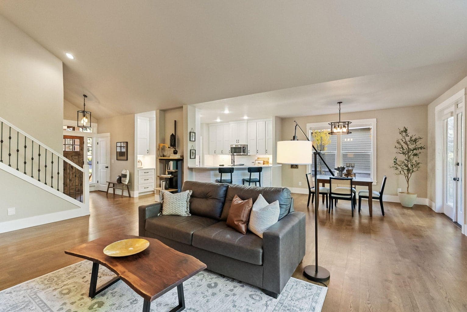 Great room with vaulted ceilings, propane fireplace and hardwood floors