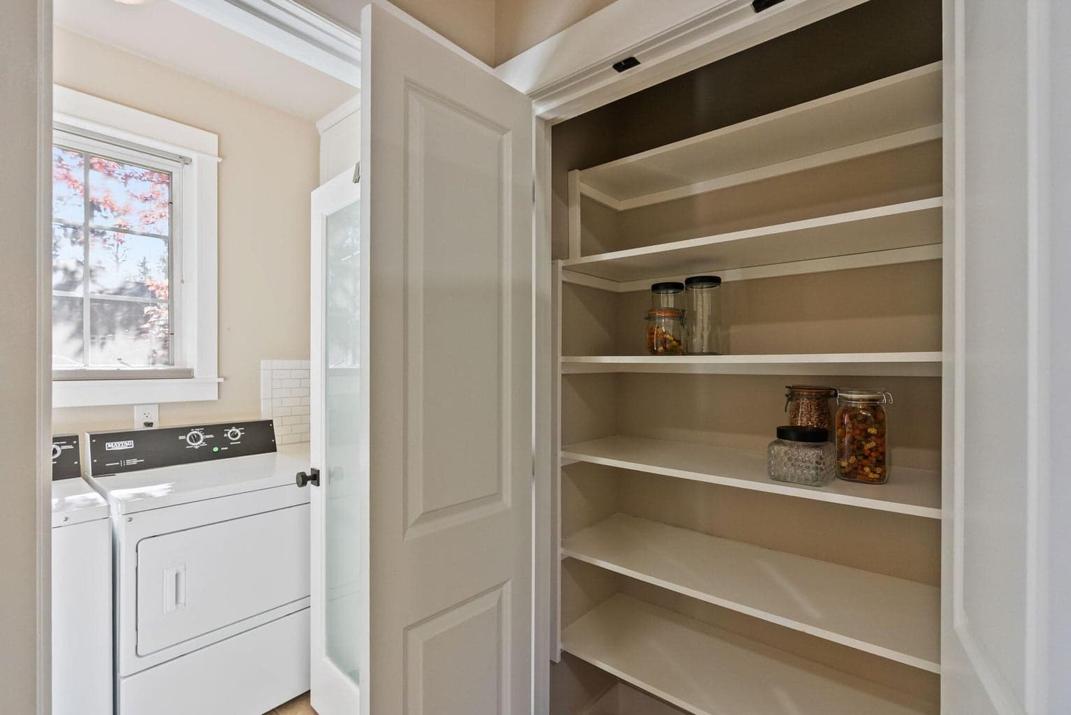 Kitchen pantry cupboard and laundry room