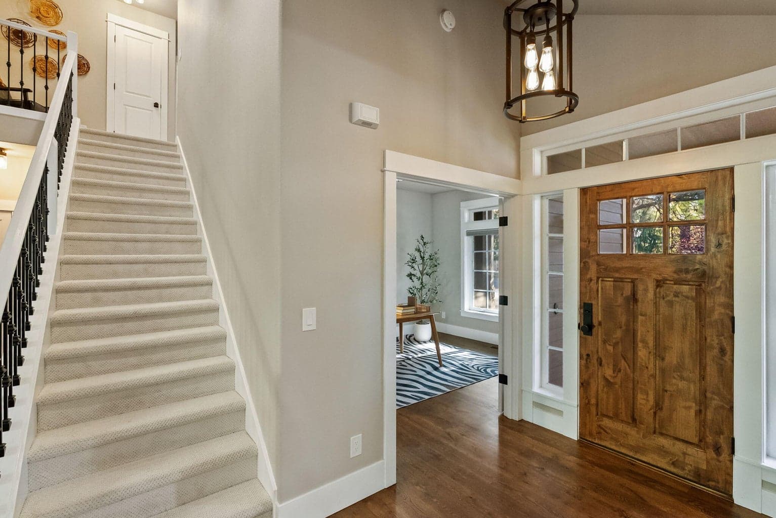 Staircase to landing, 2 bedrooms and full bath
