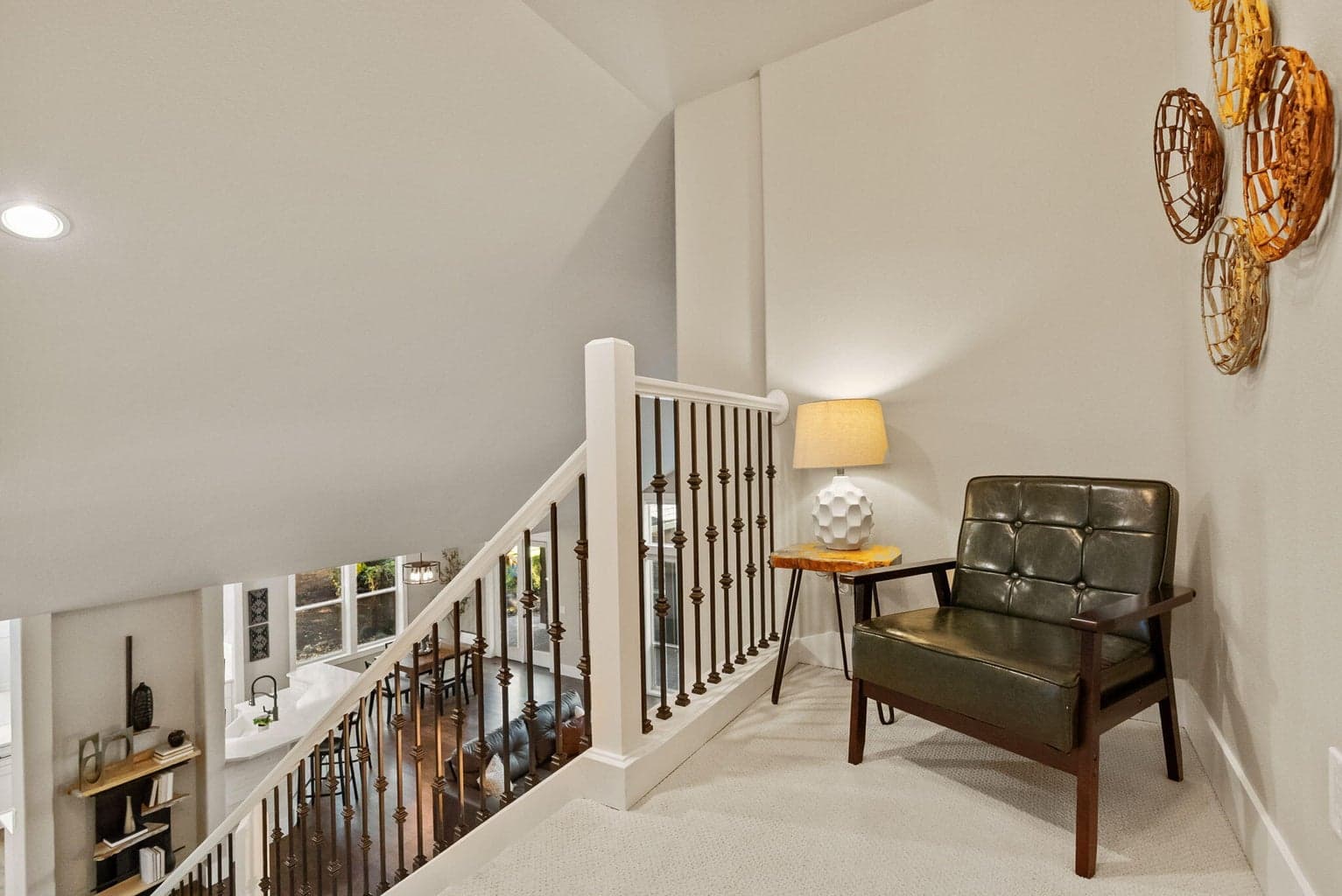 Upstairs landing for reading nook, library, desk, toy storage, or more!