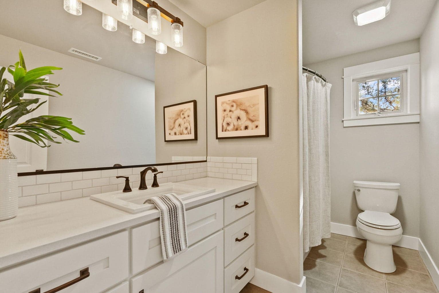 Shared upstairs bath with shower/tub combination