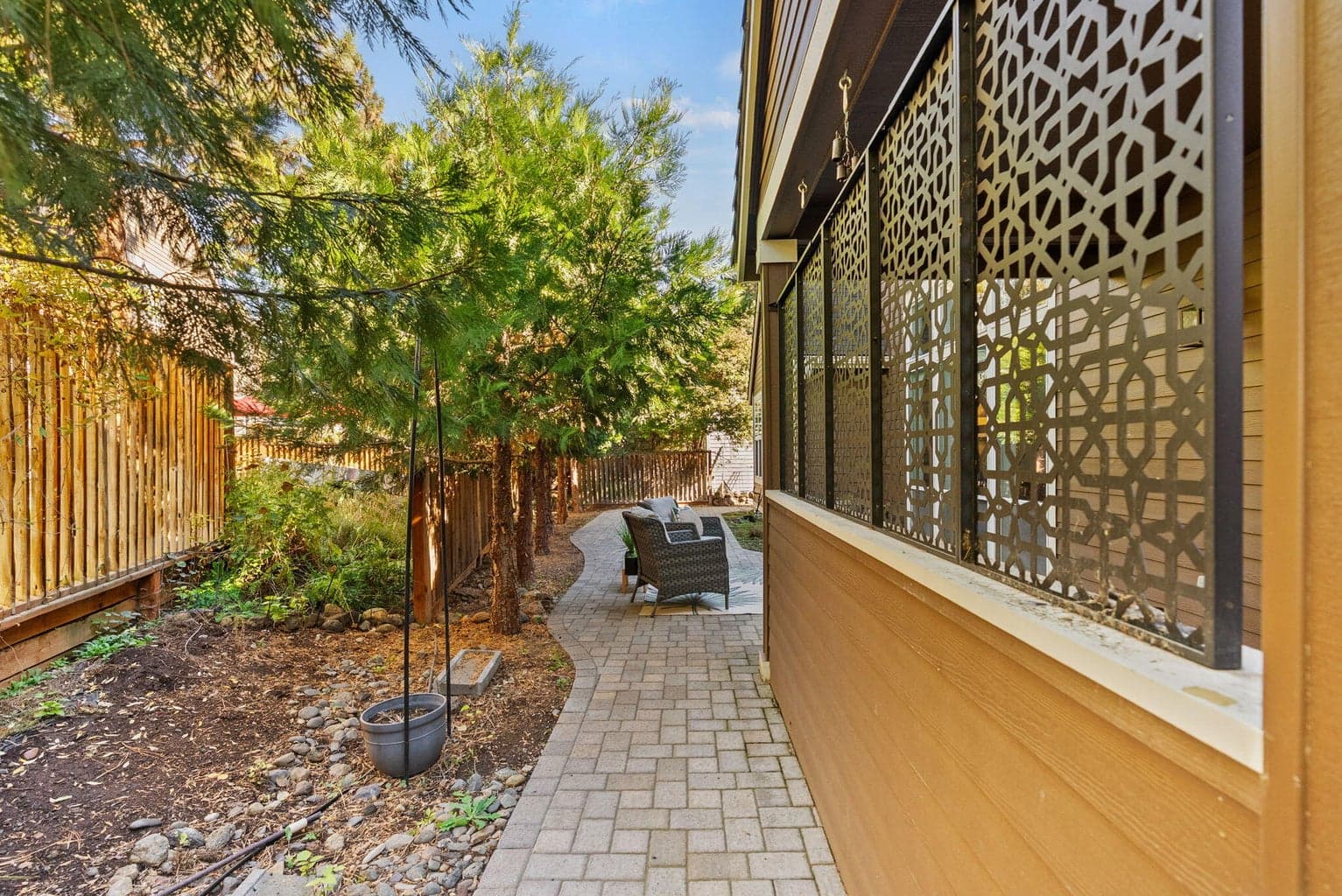 Paver patio with privacy screen and fencing panels