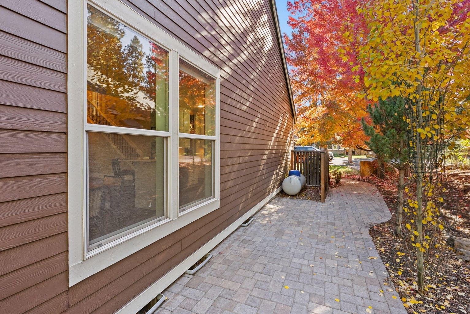 Paver side path with heat pump for heat/A/C and propane tank