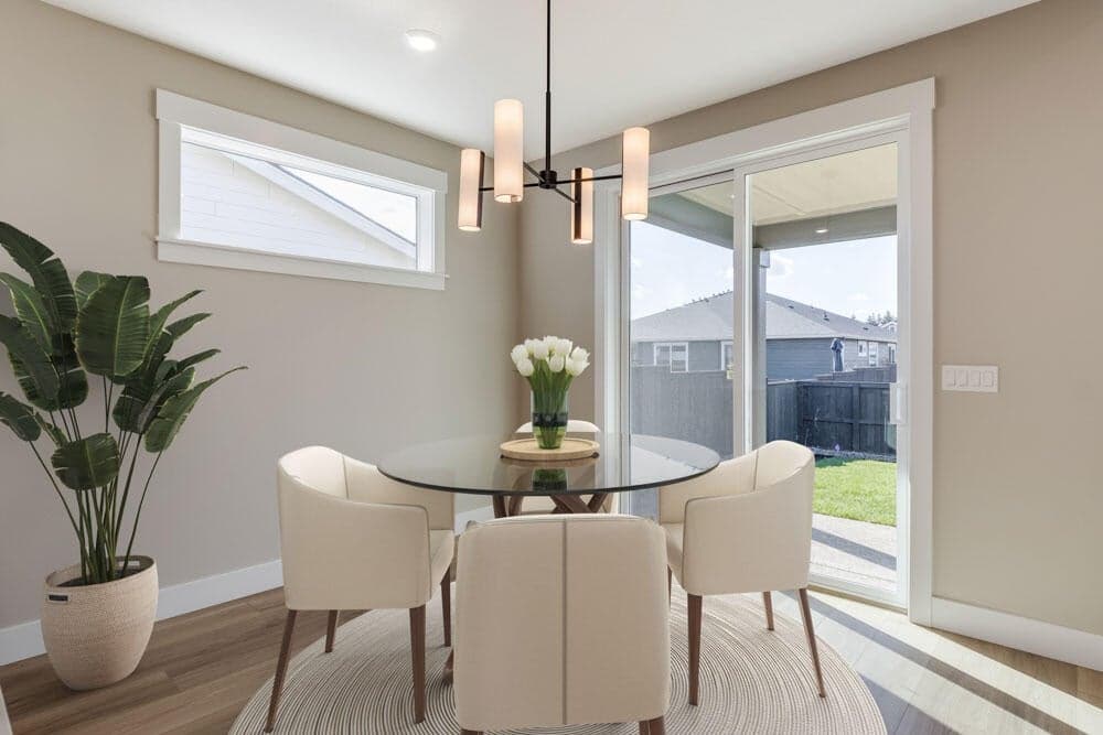 Dining area. Sample photo. Specs, design selections, and standards vary. Upgrades present.