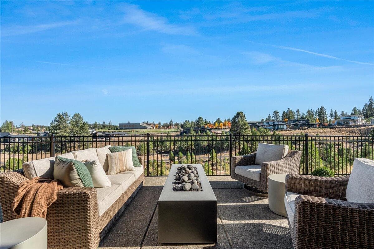 Cement Elegance fire pit with tumbled lava rocks.