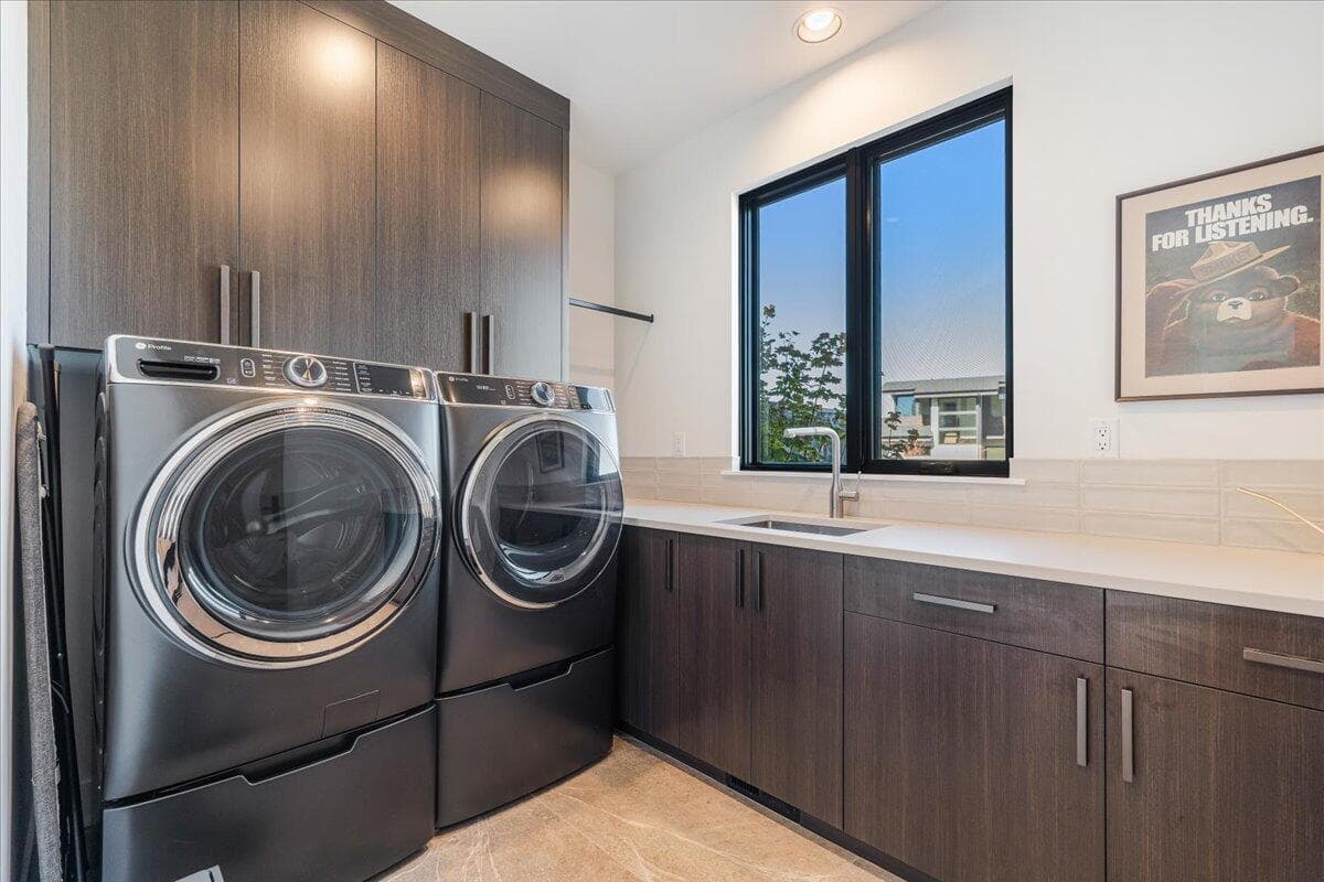 Efficient, spacious, laundry area. Washer and dryer included.