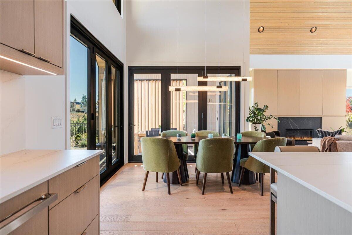 kitchen to dining. Sets of Tri-fold doors to open up the space to the outdoors.