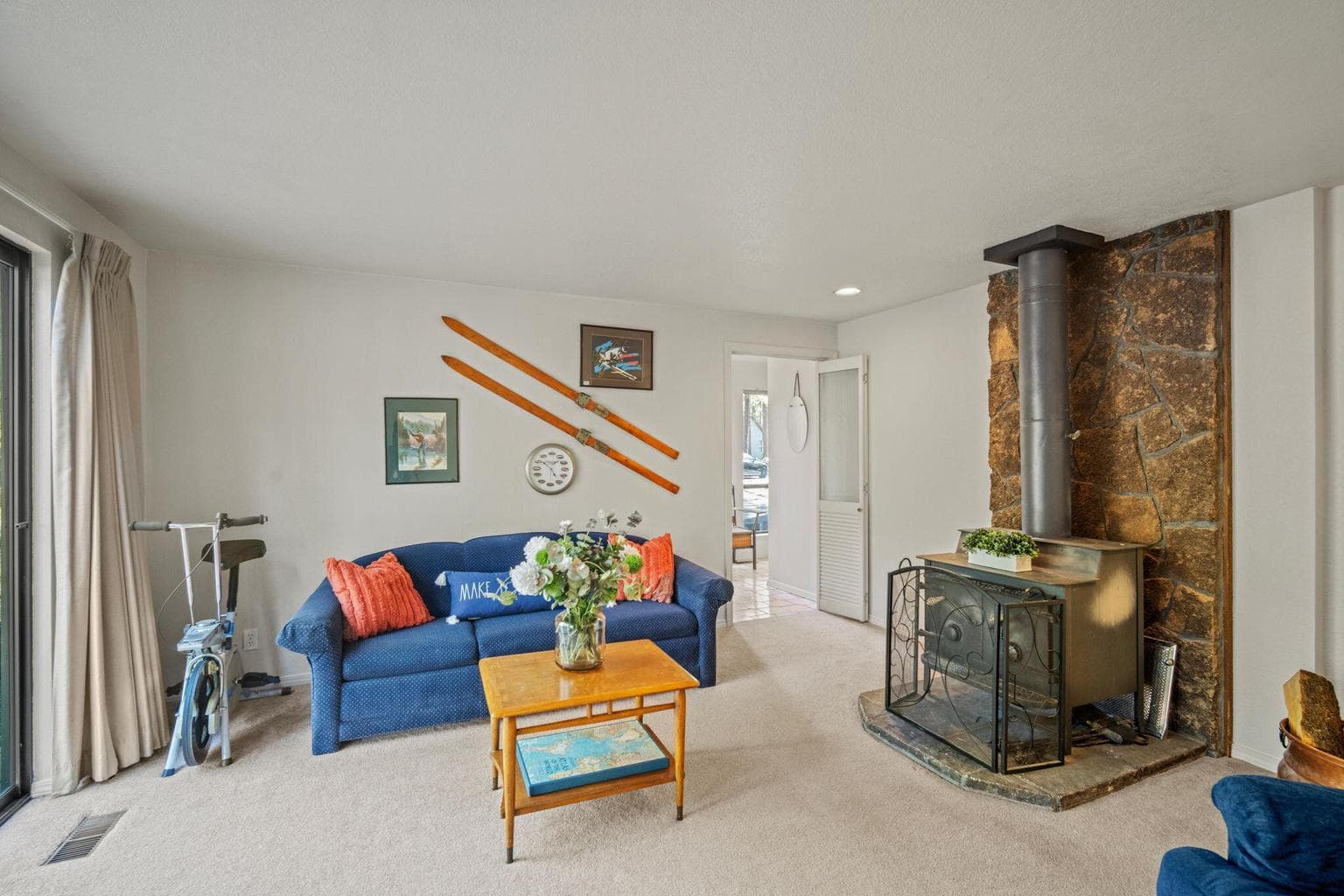 Cozy Family Room on Main Level gives separation for Guests and Family.