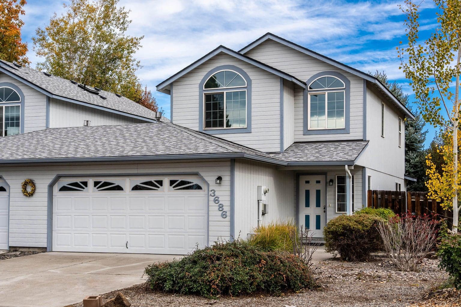 Front exterior on spacious corner lot w/2 car garage