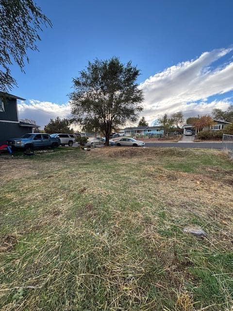 The 100' deep lot gives plenty of room to have a spacious driveway and private yard. 50' width on paved street with curb already in.