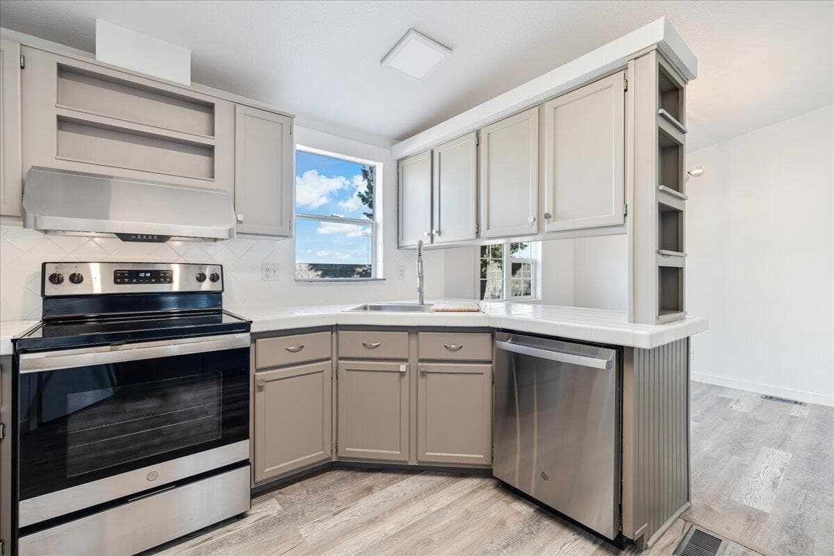 Kitchen view to dining room and nook.