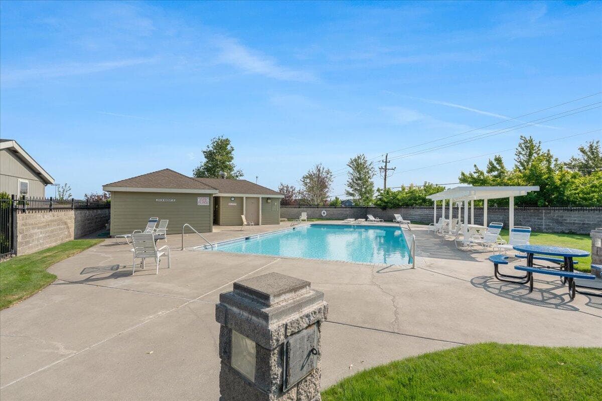 Community in-ground pool view from entry.