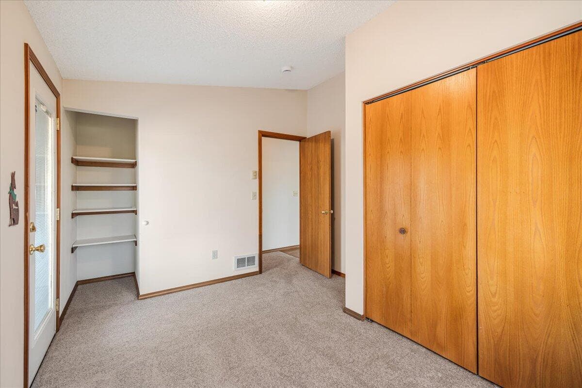 This room has access to the garden area and would be great as a bedroom or office