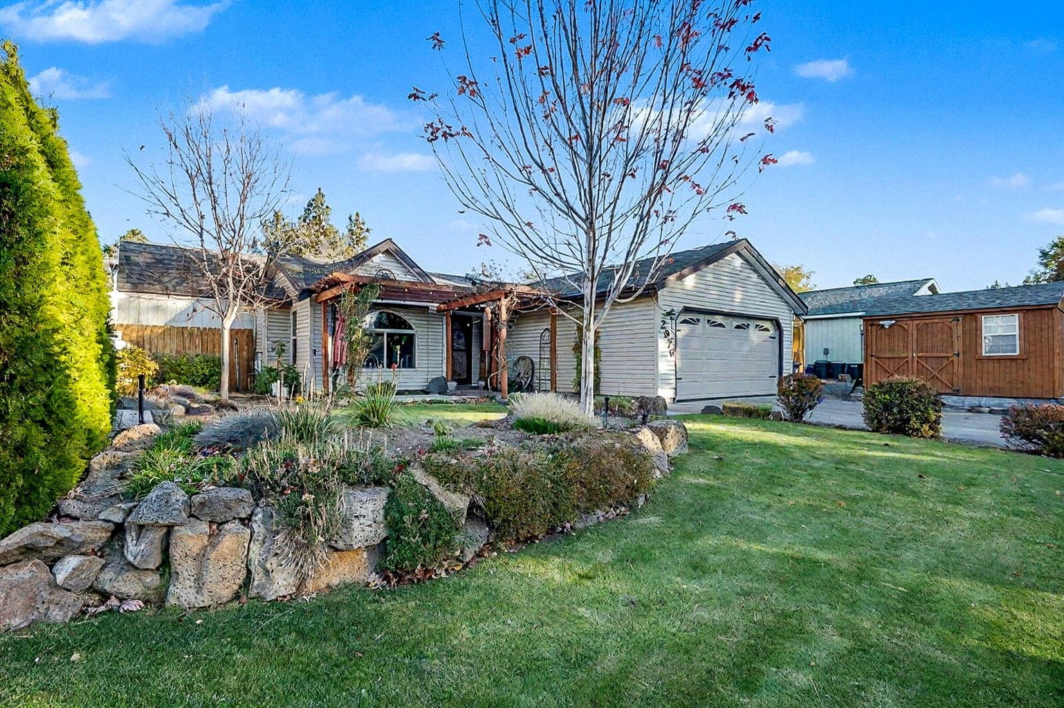 Beautifully landscaped. New storage sheds.