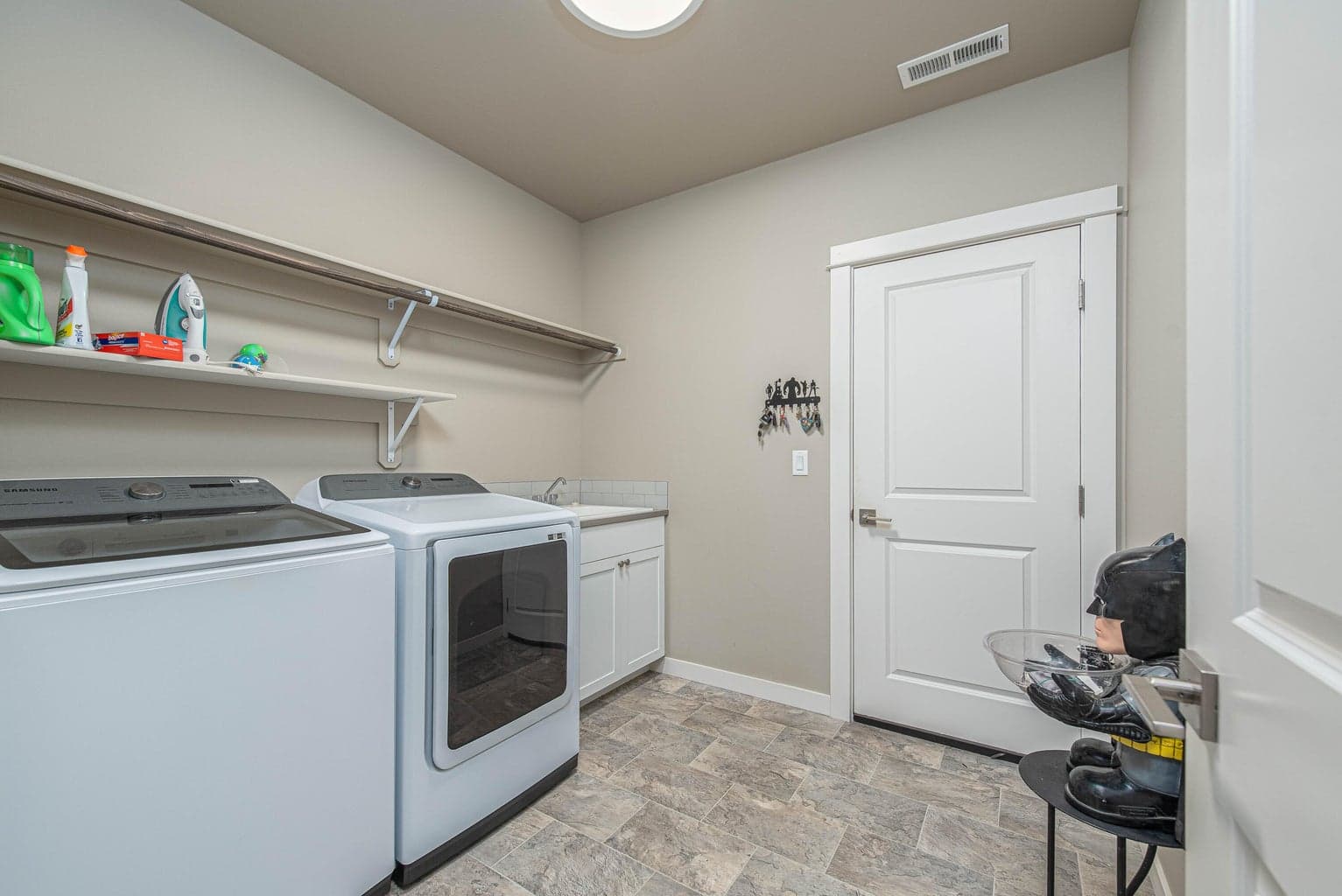 Spacious laundry room with easy access to the attached 2 car garage