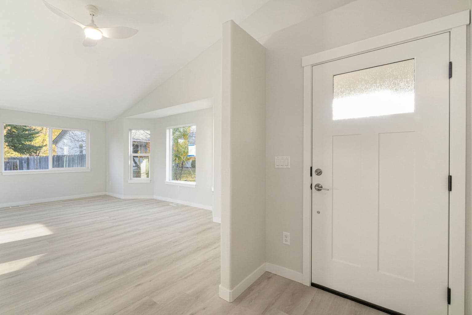 Entry with Front Door & Great Room.