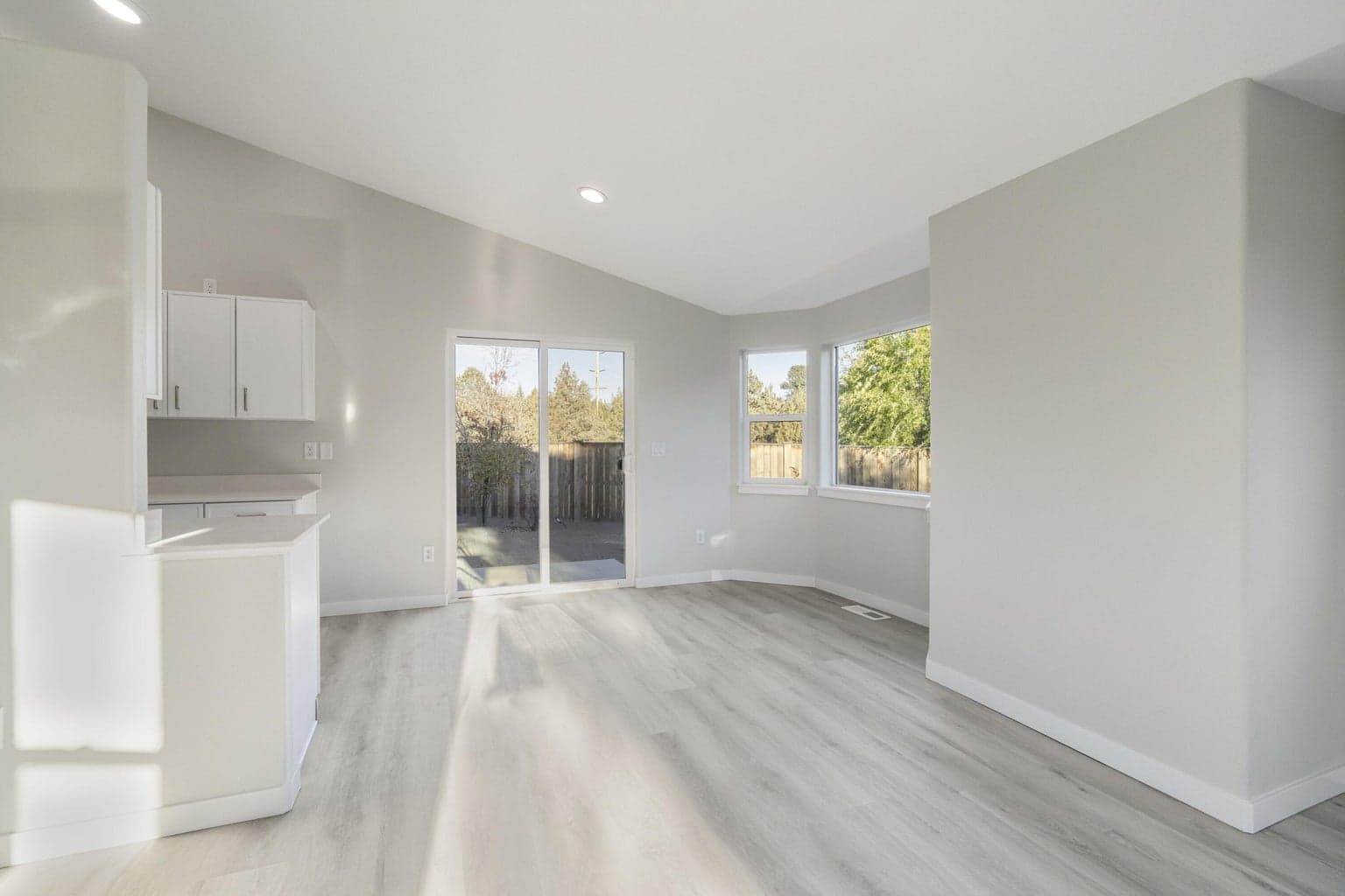 Dining Area has New Sliding Glass door to big private backyard.