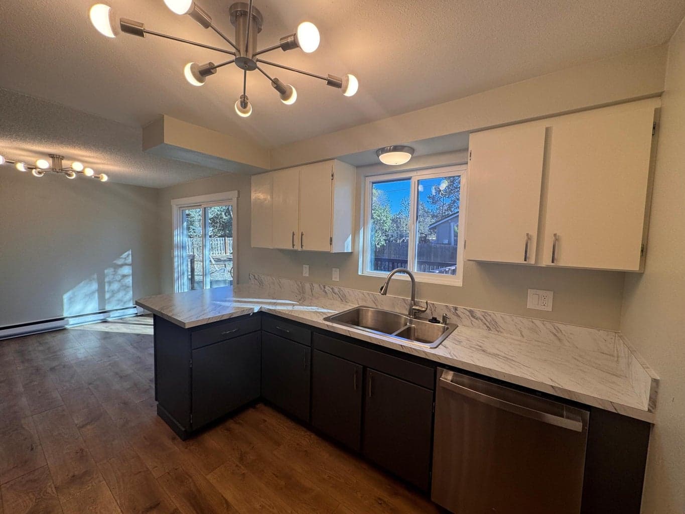 New dishwasher, counter tops & painted cabinets.