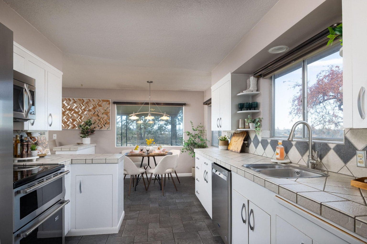 Kitchen modestly updated including newer stainless appliances