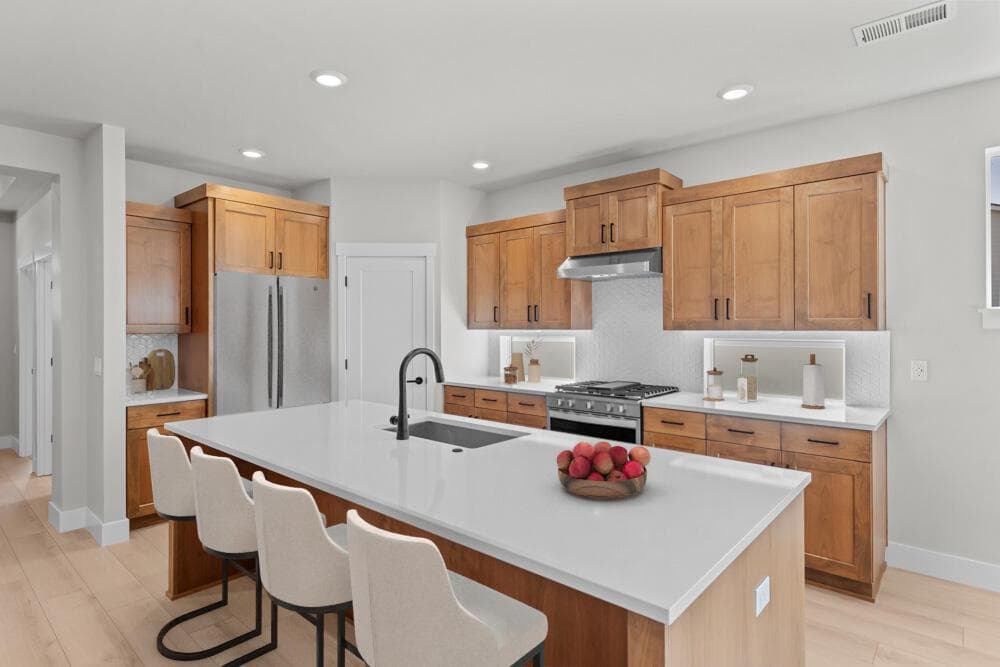 Sample kitchen, Upgrades present. Specs and standards vary.