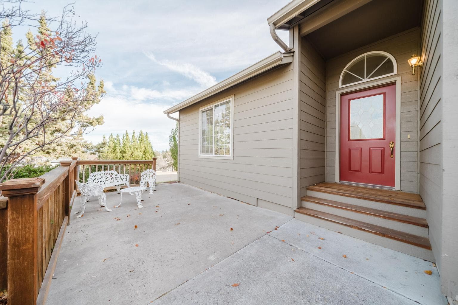 Covered entry and large front patio with room to relax and enjoy with others.
