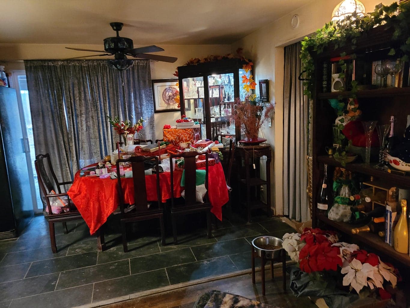 showing the stone floor in the dining area and kitchen