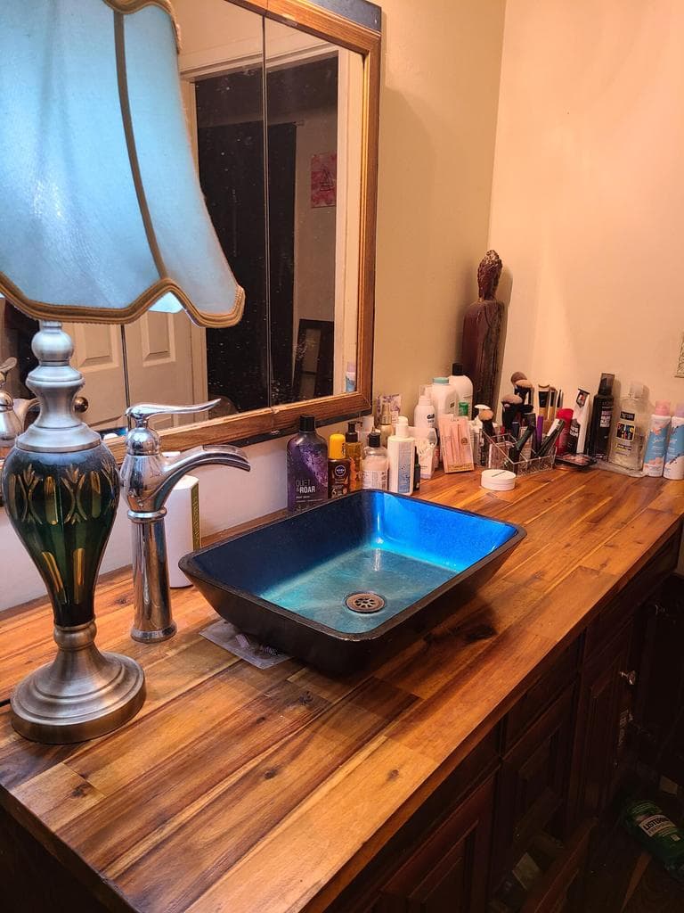 Main bathroom sink and cabinet