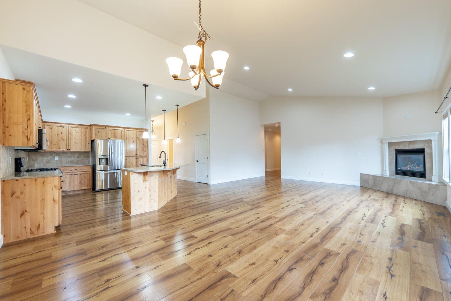 Lovely Open Floor with vaulted ceilings and wall of windows