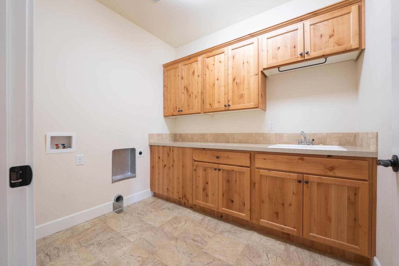 Laundry room with sink