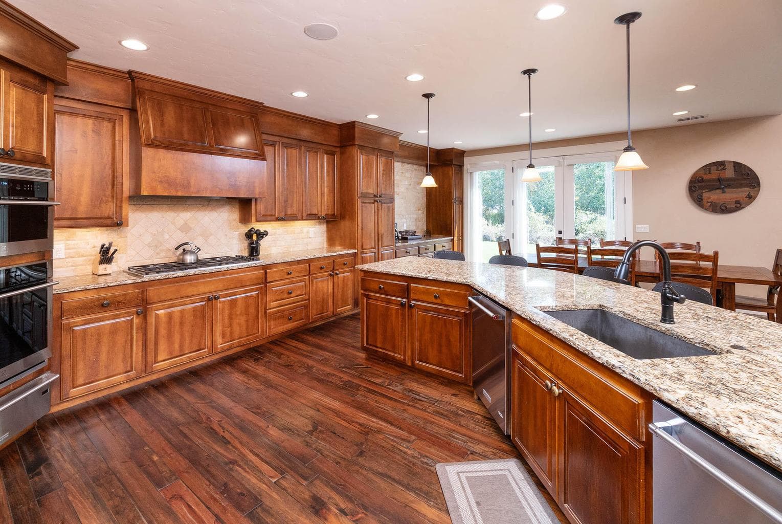 The executive kitchen is stocked with everything you need, featuring 2 ovens, 2 dishwashers and a sub-zero fridge!