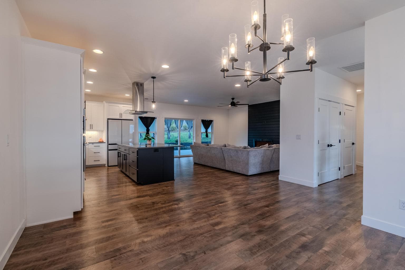 Looking from dining area toward kitchen and living area