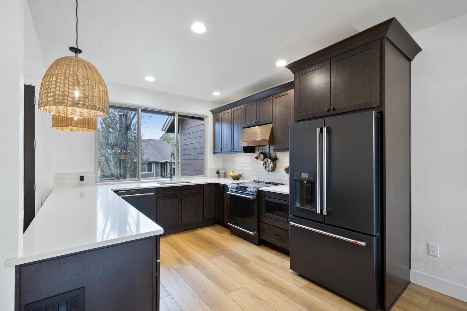 Spacious open kitchen. Greet guests as the walk-in the door!