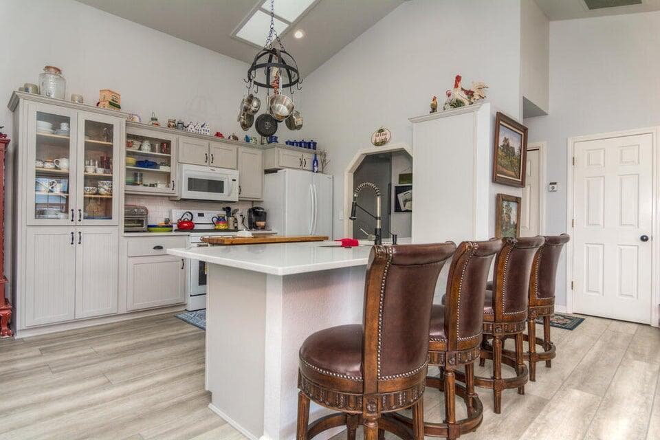 Newly remodeled kitchen and dining bar with LVP flooring