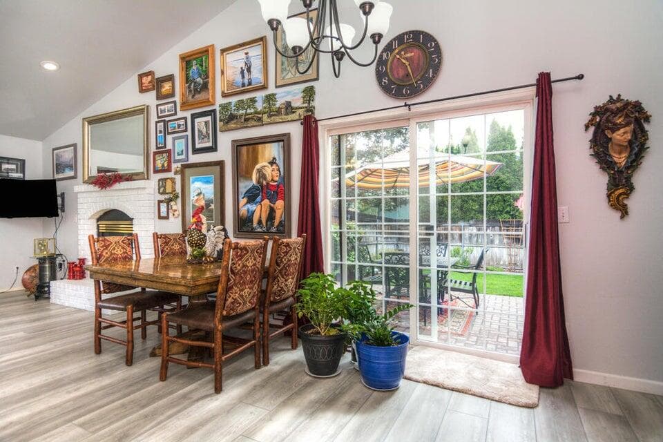 Here is the dining area and back sliding door to the side deck