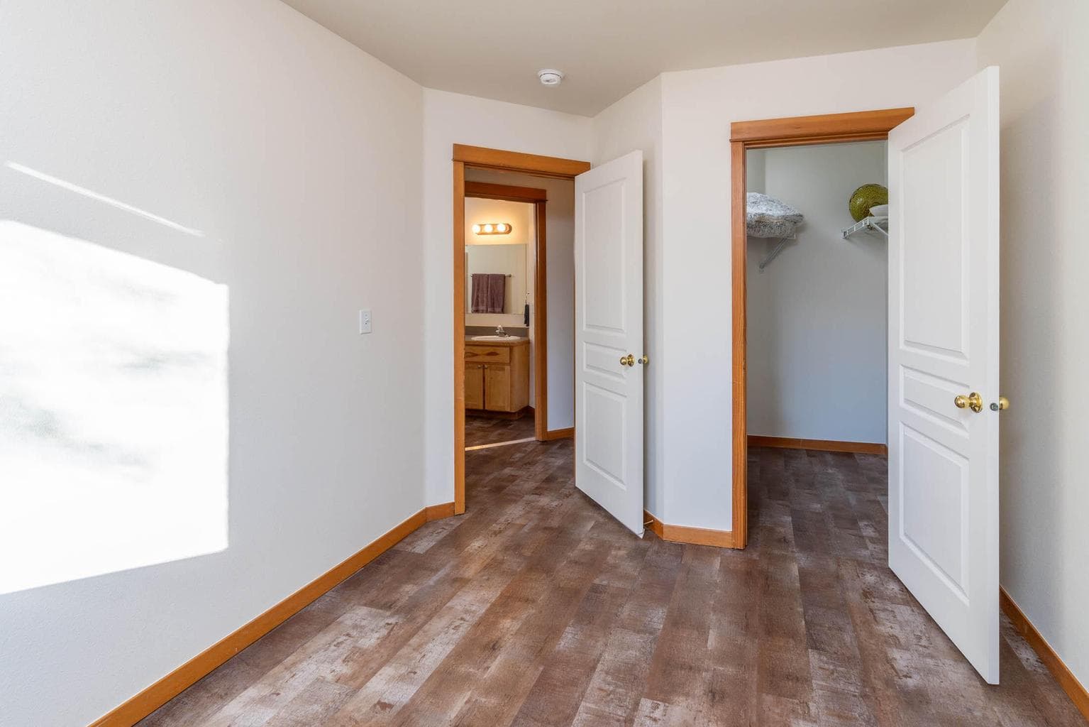 At the top of the stairs, 2nd Bedroom with large walk-in closet and across the hall from a full bath