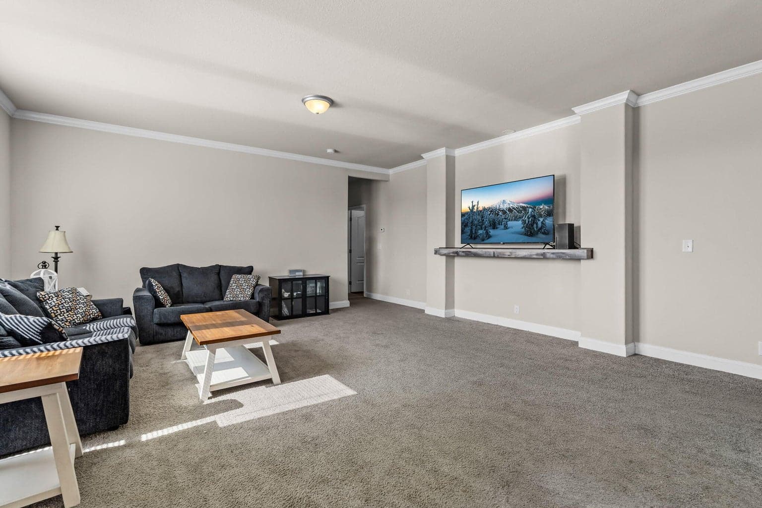 Living area is a bright, open-concept space designed for comfort and modern style.